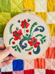 an embroidered piece in a hoop